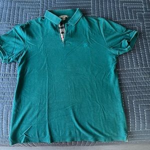 Men Burberry polo. Fairly worn